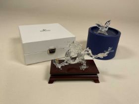 SWAROVSKI CRYSTAL GLASS; Crystal Zodiac Year of the Dragon, boxed, and a butterfly on leaf, boxed.