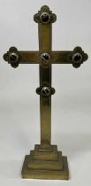 A brass altar cross with inlaid agate cabochons, height 60cm, width 27cm