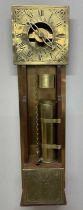 A contemporary 17th century style brass and stained beech water clock with Roman numerals to the