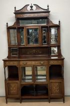 A rosewood and inlaid mirrored back sideboard, the upper section having several mirrored sections,