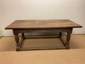 An oak refectory table with plank top, height 75cm, width 198cm, depth 93cm.