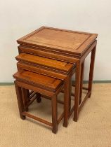 GEORGE ZEE; a Chinese hardwood nest of tables, height 64cm, width 51cm, depth 38cm.