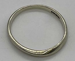 A white gold wedding band, size O, 1.8g