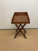 A late 19th century mahogany butler's tray on stand.