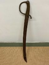 An 1876 pattern cavalry sword with brass grip, length 72cm.