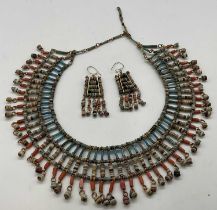 An Egyptian necklace and pair of earrings formed from original early faience beads, the necklace