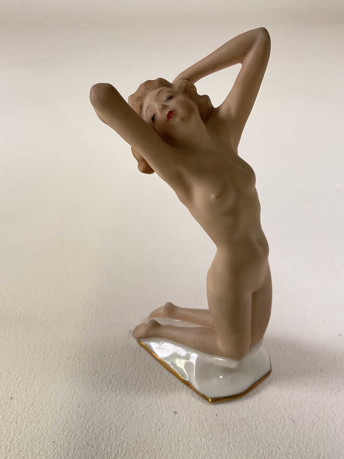 A German Hutschenreuther porcelain figure of a female nude kneeling with her arms and back - Image 2 of 4