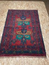 A Baluchi rug, 124 x 86cm.