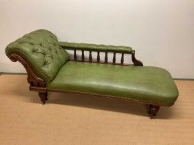 A later leather upholstered Victorian chaise longue with wooden frame length 206cm, width 77cm,