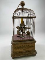 IN THE MANNER OF BLAISE BONTEMS; a large circa 1900 single bird automaton musical birdcage with gilt