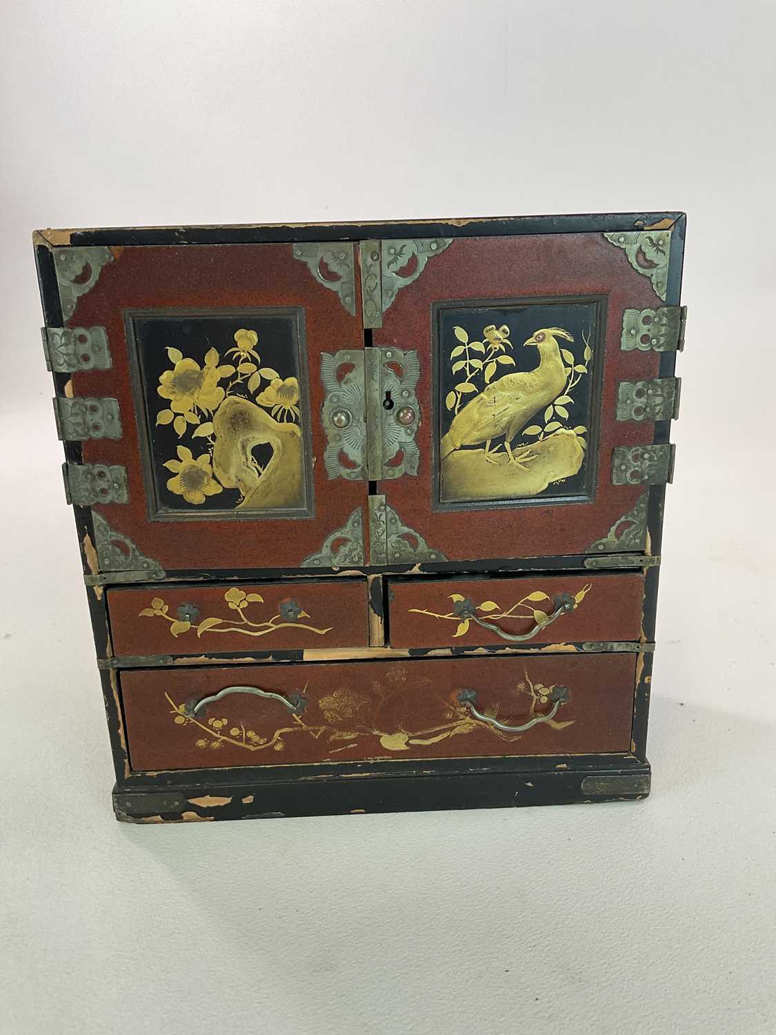 A Chinese lacquered table top cabinet with painted and gilt decoration of birds and flowers and - Image 2 of 5