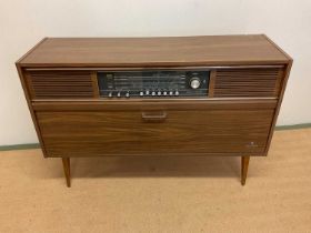 A Grundig cabinet stereo system.