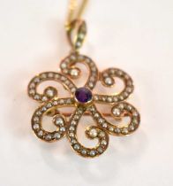 A 9ct yellow gold Edwardian amethyst and seed pearl pendant/brooch suspended on a 9ct yellow gold