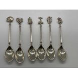 PATRICK MAVROS (Zimbabwean); a set of six silver coffee spoons, each terminal decorated with a