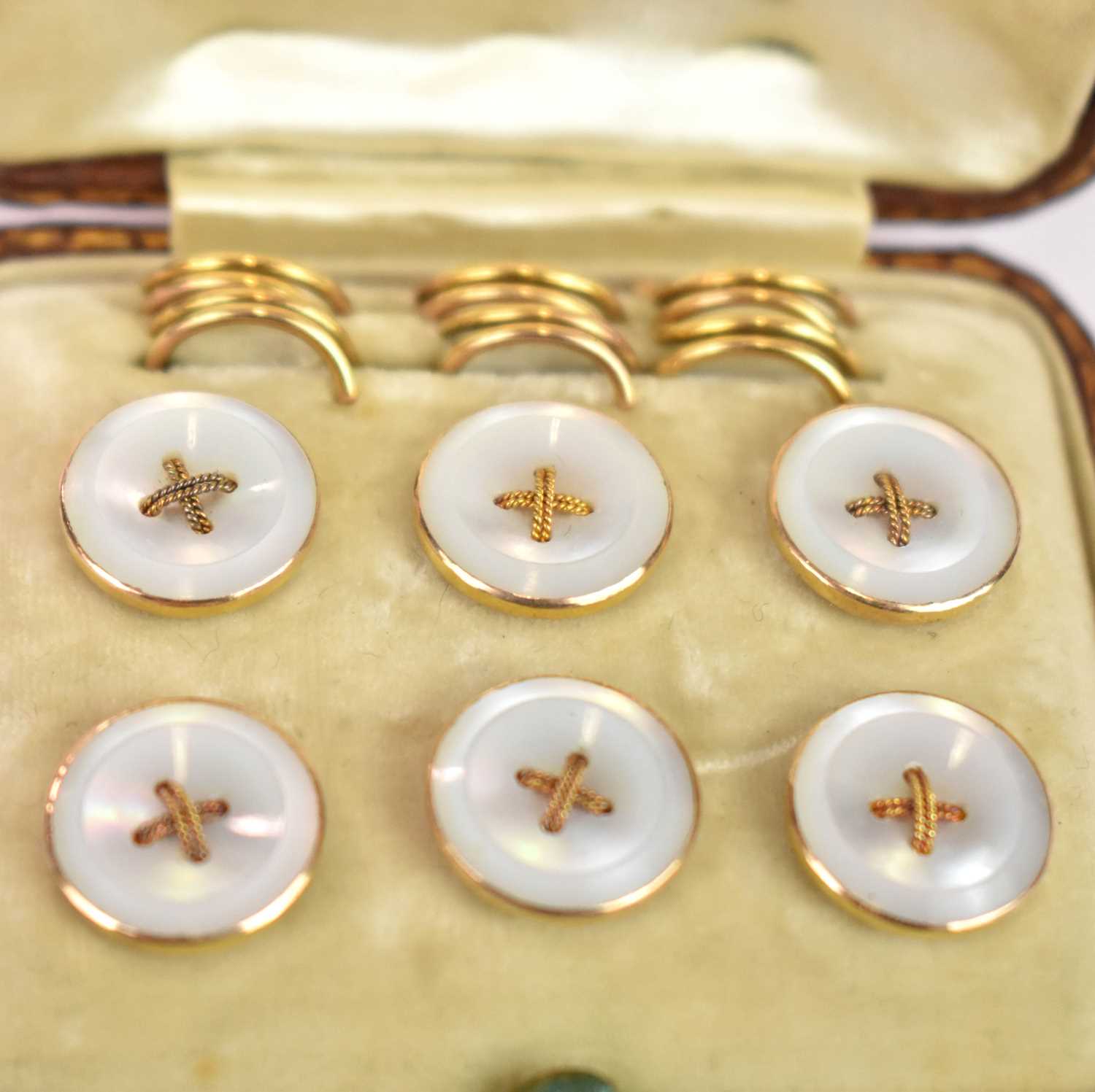 A cased set of six Edwardian 15ct yellow gold button studs with mother of pearl faces, complete with - Image 3 of 3