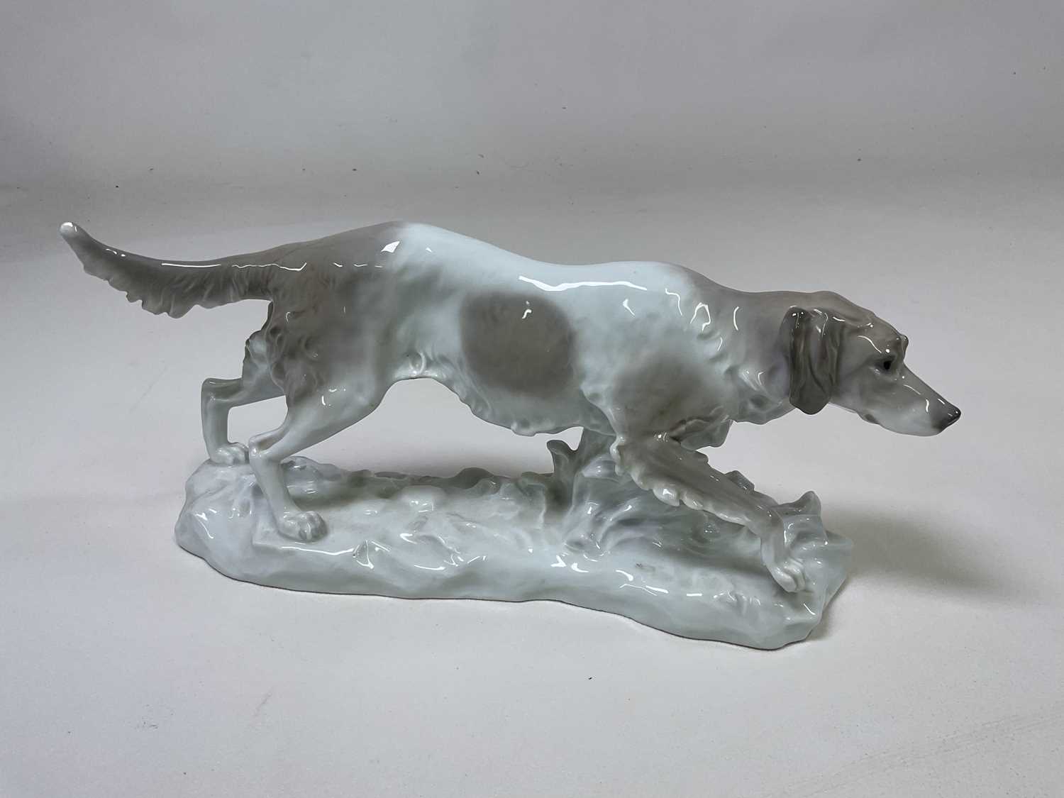 KARL ENS; a large porcelain figure of a dog, painted mark and incised number 7978 to base, length