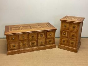 A substantial low double sided chest/coffee table, height 55cm, width 199cm, and matching chest of