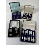 A cased set of six hallmarked silver pastry forks, Birmingham, a cased set of four hallmarked silver