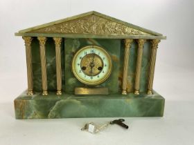 A green onyx mausoleum mantel clock with presentation plaque, height 29cm, width 43cm.