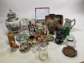 A large collection of assorted ceramics and glass.