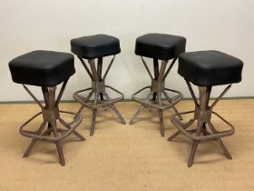 EVERTAUT; a set of four mid 20th century industrial machinists stools, with black leatherette