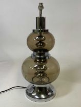 DORIA LEUCHTEN, GERMANY; a mid 20th century chrome and smoked glass table lamp, 51cm high.