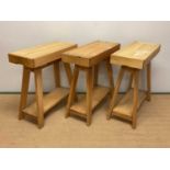 Three beech artist's tables with single drawer to the front and raised on four angled supports,