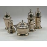 ELKINGTON & CO LTD; a pair of hallmarked silver cruets (marks obscured), height 11.5cm, a lidded