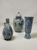 A 19th century Chinese floral decorated blue and white tall vase, height 27cm, a large Delft Dutch