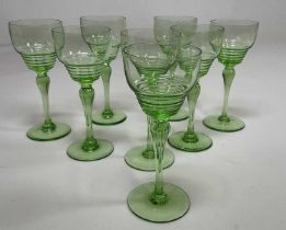 STUART CRYSTAL; eight green Art Deco hock glasses, height 17.5cm