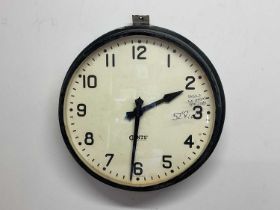 GENTS OF LEICESTER; an industrial wall clock with metal and glazed case, the dial with Arabic