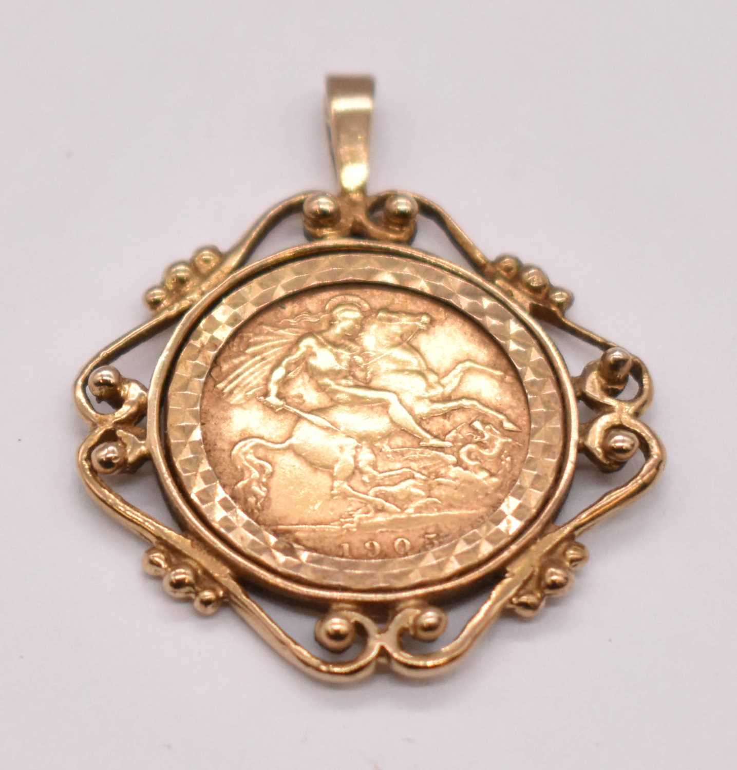 An Edwardian half sovereign, 1905, in 9ct yellow gold pendant mount, approx. 8.3g.