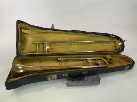 CORTON; a brass trombone in case, a/ f condition