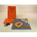 HERMES; a boxed 'Cliquetis' silk scarf in ciel colourway, designed by Julie Abadie in original