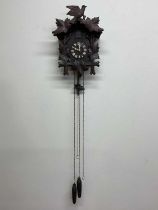 SIR PATRICK MOORE CBE HON FRS FRAS (1923-2012); his personal cuckoo clock with carved detail,