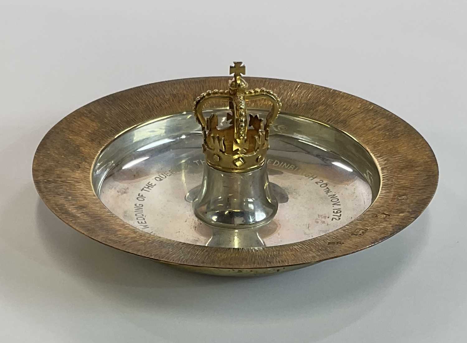 A cased Elizabeth II hallmarked silver commemorative bowl centred with a crown and with textured