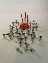 WERNER STOFF FOR NAGEL; a set of twelve chromed stacking candle holders of triangular form (one