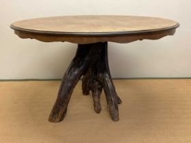 A late 19th century walnut and tree root appendage tilt-top table, a Victorian curio erotic men's