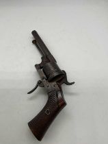 A late 19th century Belgian six shot pin fire pistol with incised stock and turned barrel, unmarked,