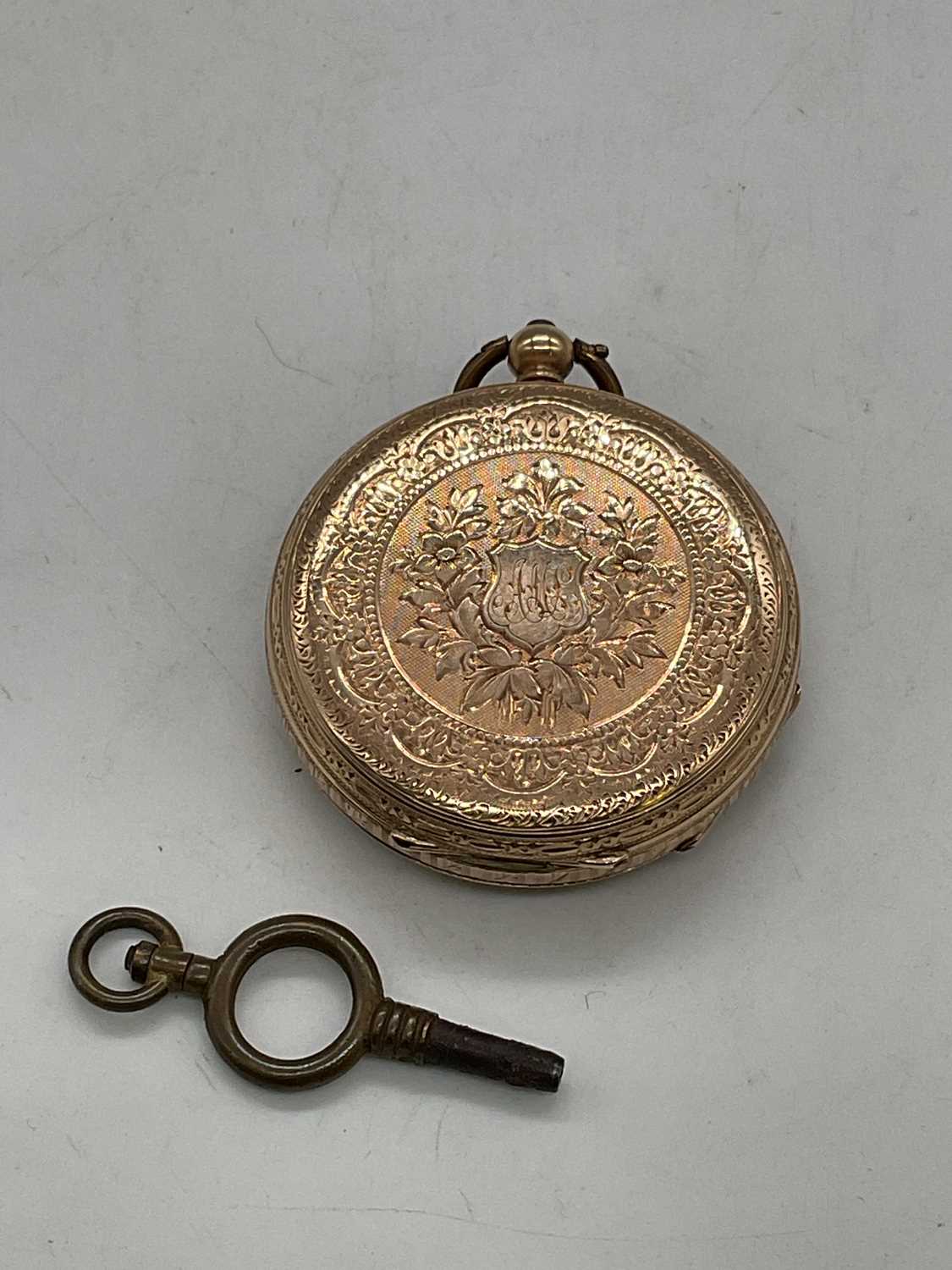 A late 19th century 14ct gold key wind open face fob watch with Arabic numerals to the chapter - Image 3 of 4