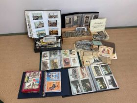 A very large and detailed collection of postcards, many military examples including real photograph,