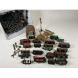 HORNBY; 0 gauge items including three locomotives, various rolling stock and other items, with a