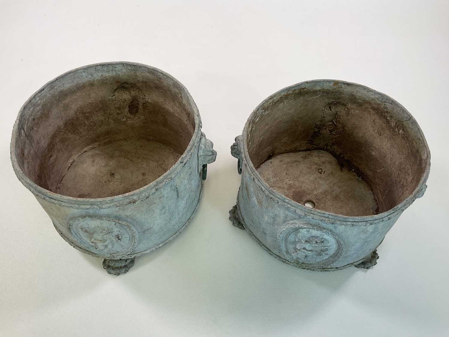 A pair of Georgian style lead planters of circular form with lion mask and ring mounts along with - Image 2 of 3