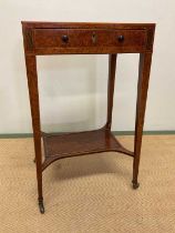 A Regency burr yew wood veneered and inlaid side table, the rectangular top with moulded gallery