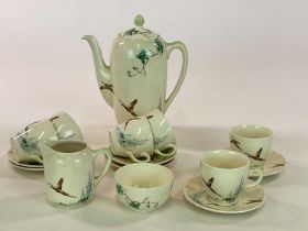 ROYAL DOULTON; a coffee service in 'The Coppice' pattern D.5803, comprising coffee pot, jug, bowl,