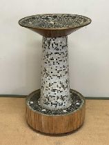 A mid 20th century Swedish mosaic water fountain, of circular form, the column with various lights