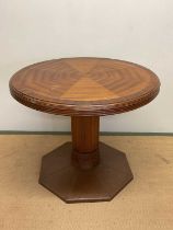 A Danish Arts and Crafts centre table with a octagonal hammered and riveted copper base with