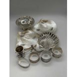 A group of small hallmarked silver items including an Edwardian hallmarked silver scallop shaped