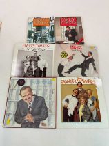FAWLTY TOWERS; a small group of records and two books relating to the popular television show.