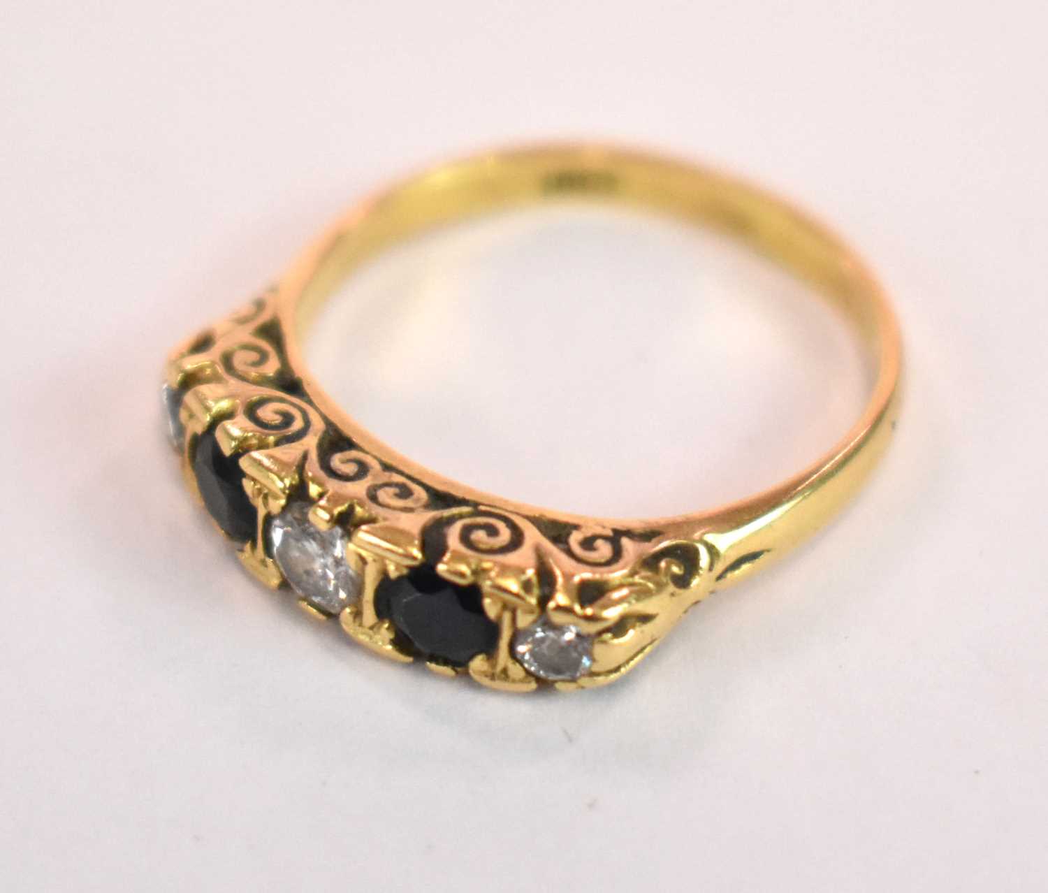 An 18ct yellow gold five stone diamond and sapphire ring, size O, approx. 4.1g. - Image 2 of 2